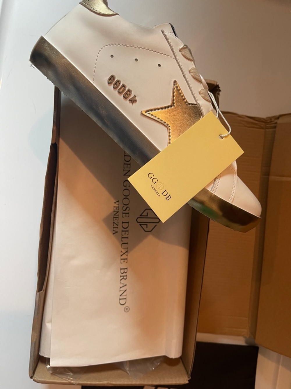 Golden star sneaker with Black Branded Dust Bag